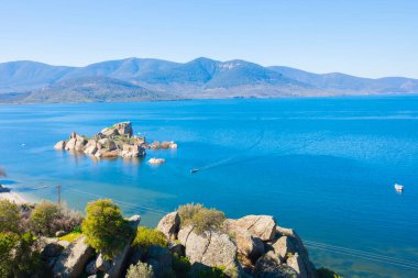 Bafa lake is a peaceful place, ringed by traditional villages such as Kapkr full of fisherman boats and ruins of Herakleia