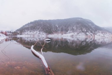 Frozen lake in snowy winter landscape, Cubuk lake - Goynuk - Bolu - Turkey
