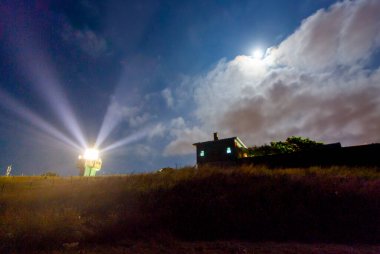 Karaburun harbor and Karaburun lighthouse, night star photography and astrophotography