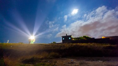 Karaburun harbor and Karaburun lighthouse, night star photography and astrophotography