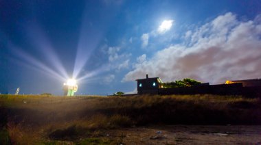 Karaburun harbor and Karaburun lighthouse, night star photography and astrophotography
