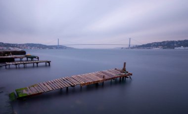 The military high school with a tower, photographed with the long exposure technique, is an excellent historical building. Opposite it is the Bosphorus Bridge (July 15 Martyrs Bridge).