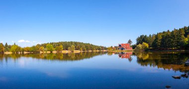 Golcuk National Park Bolu Turkey. Autumn wooden Lake house inside forest in Bolu Golcuk National Park, Turkey
