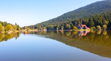 Golcuk National Park Bolu Turkey. Autumn wooden Lake house inside forest in Bolu Golcuk National Park, Turkey