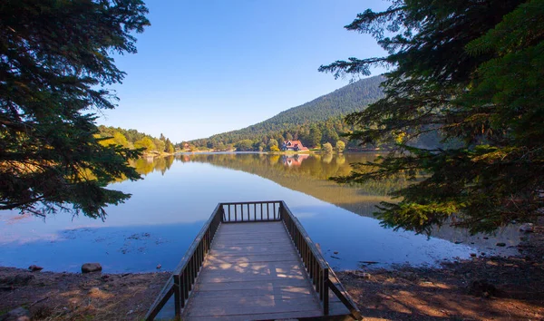 Golcuk National Park Bolu Turkey. Autumn wooden Lake house inside forest in Bolu Golcuk National Park, Turkey