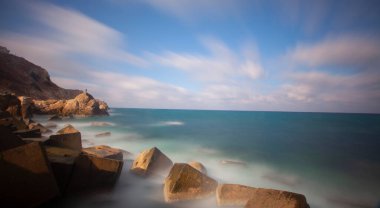 Fantastic photos taken with panorama long exposure technique in a wavy harbor
