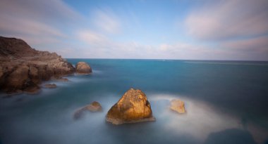 Fantastic photos taken with panorama long exposure technique in a wavy harbor