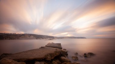 Fantastic photos taken with panorama long exposure technique in a wavy harbor
