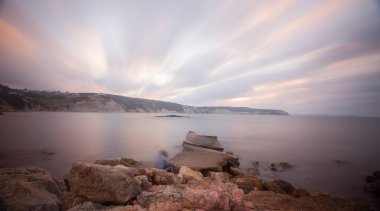 Fantastic photos taken with panorama long exposure technique in a wavy harbor