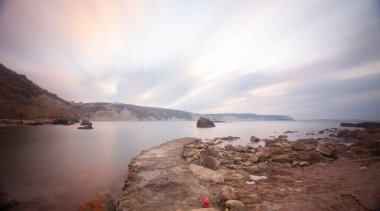 Fantastic photos taken with panorama long exposure technique in a wavy harbor