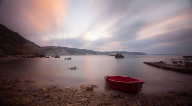 Fantastic photos taken with panorama long exposure technique in a wavy harbor