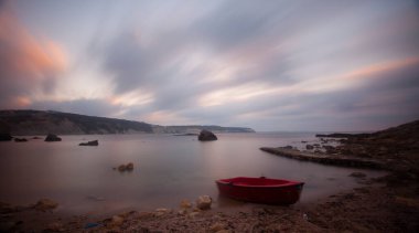 Fantastic photos taken with panorama long exposure technique in a wavy harbor