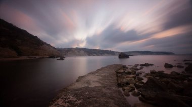 Fantastic photos taken with panorama long exposure technique in a wavy harbor