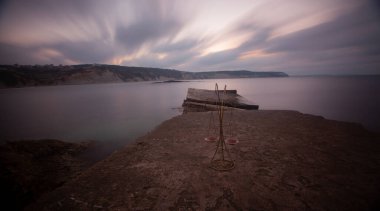 Fantastic photos taken with panorama long exposure technique in a wavy harbor