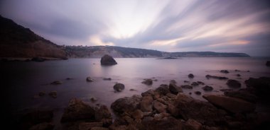 Fantastic photos taken with panorama long exposure technique in a wavy harbor