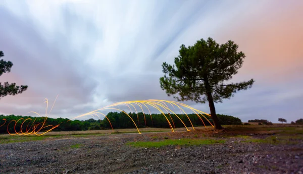 Steel wool and astrophotography, photographed at night with the long exposure technique.