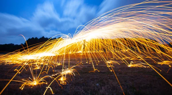 Steel wool and astrophotography, photographed at night with the long exposure technique.