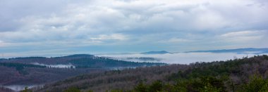 Aerial view of belgrade forests, panoramic shot on a foggy day / istanbul