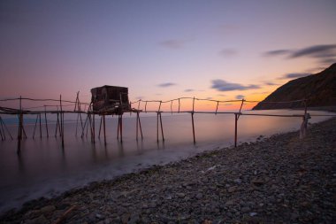 An old ship washed ashore from the sea