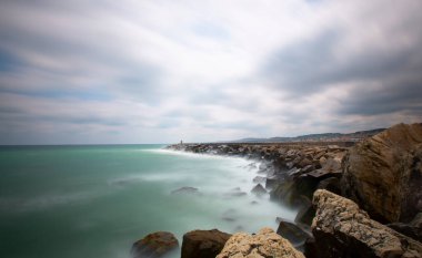 Cape Yason (Turkish: Cape Yason) A very choppy sea photographed with a long exposure technique.Thursday (formerly Vona) district, Ordu Province, Turkey