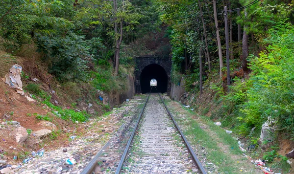 A railroad tunnel with a light at the end. Can represent achieving your goals, getting through problems and obstacles or simply represent exactly what you can see - an old tunnel.