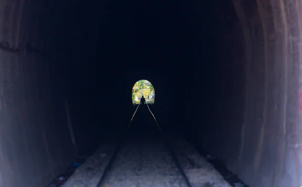 A railroad tunnel with a light at the end. Can represent achieving your goals, getting through problems and obstacles or simply represent exactly what you can see - an old tunnel.