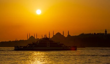 Blue Mosque and Hagia Sophia , Wonderful Istanbul view at sunset, sun dancing between minarets
