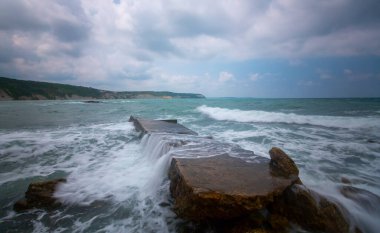 Gerzede basalt cliffs harbor area photographed with long exposure technique.