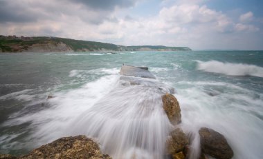 Gerzede basalt cliffs harbor area photographed with long exposure technique.