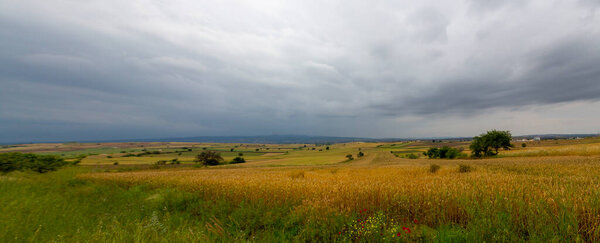 Windows view of blue clouds and cultivated fields , Corlu Turkey