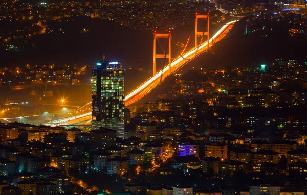 Istanbul City Night Aerial Image, Skyscrapers and Bosphorus Bridge