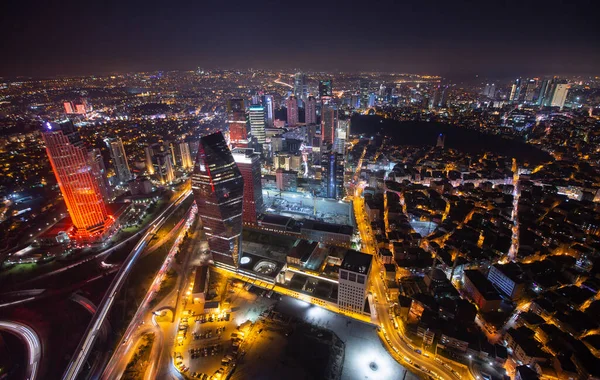 Istanbul City Night Aerial Image, Skyscrapers and Bosphorus Bridge