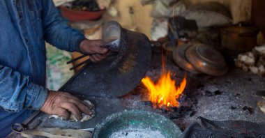 Bakır işçisi ve temizlik bakırı.