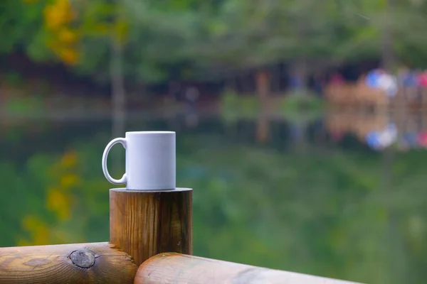 Autumn and coffee mug .