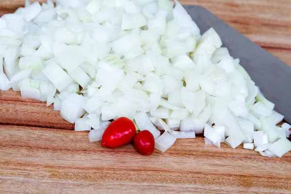 Fresh Diced Onion with Knife and Chillis — Stock Photo, Image