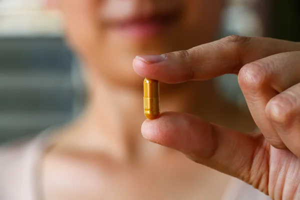 Pills on hand — Stock Photo, Image