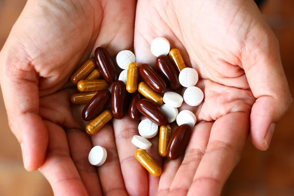 Pills on hand — Stock Photo, Image