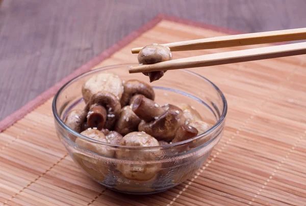 Fried mushroom in a chopstick — Stock Photo, Image
