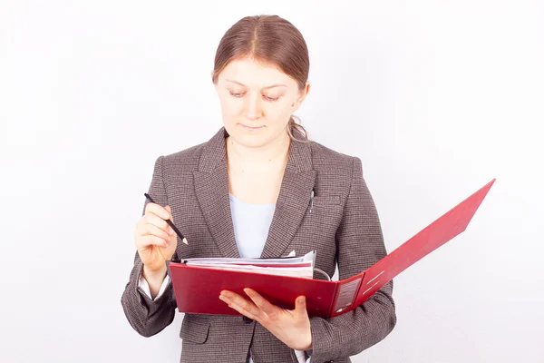 Business joung woman with red folder and a pencil — Stock Photo, Image