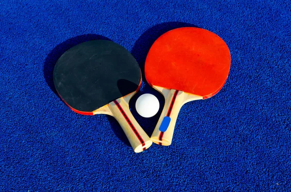 Ping pong table tennis rackets colored. High quality photo