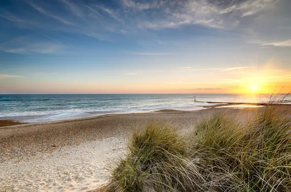 Strand vid solnedgången — Stockfoto