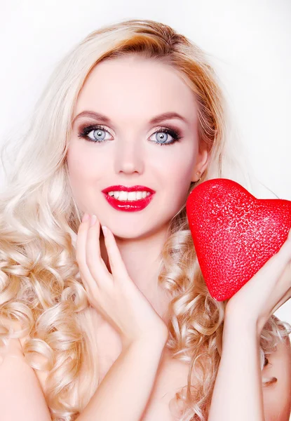 Smiling girl with Valentine's heart — Stock Photo, Image