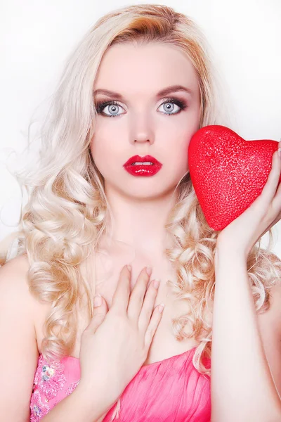 Blonde woman with red heart — Stock Photo, Image