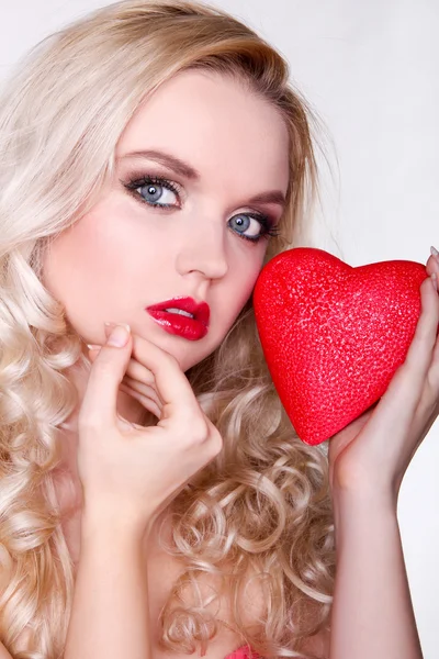 Woman with red heart — Stock Photo, Image