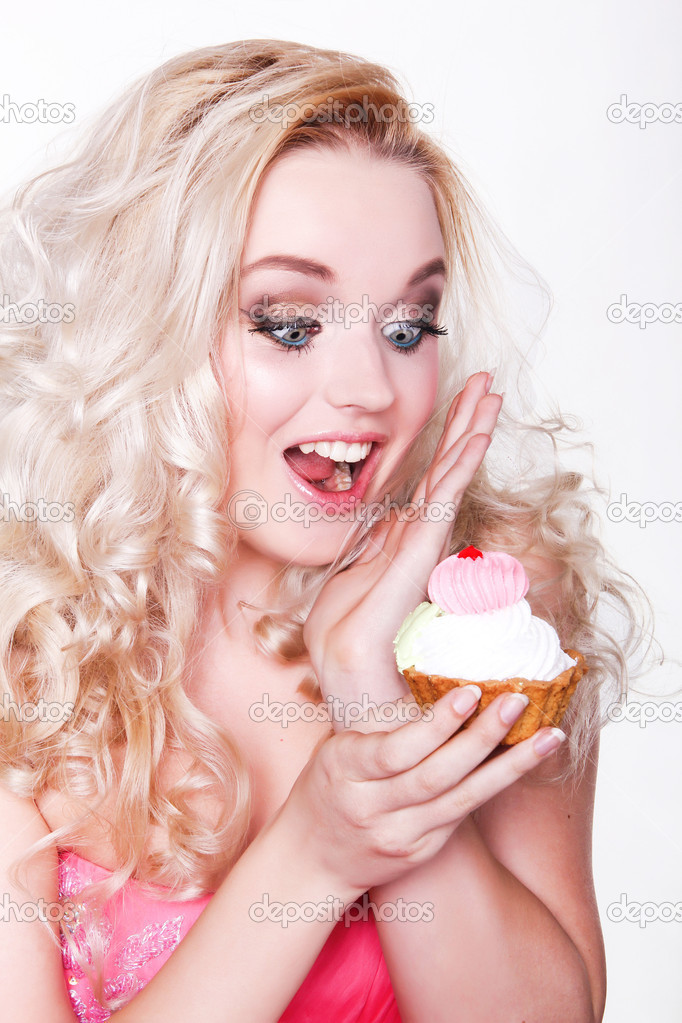Cheerful girl with cake