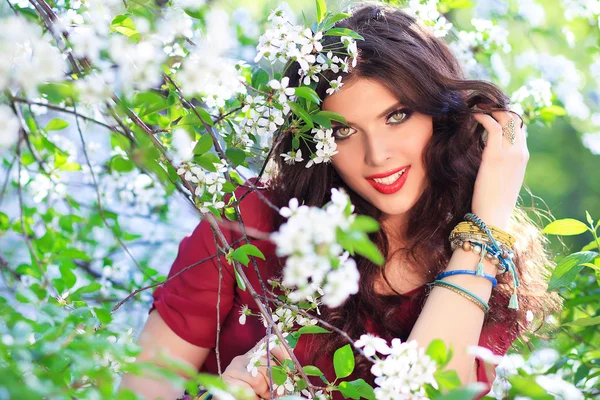 Model with cherry flowers — Stock Photo, Image
