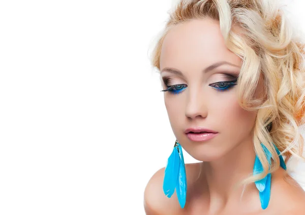 Model with blue earrings — Stock Photo, Image