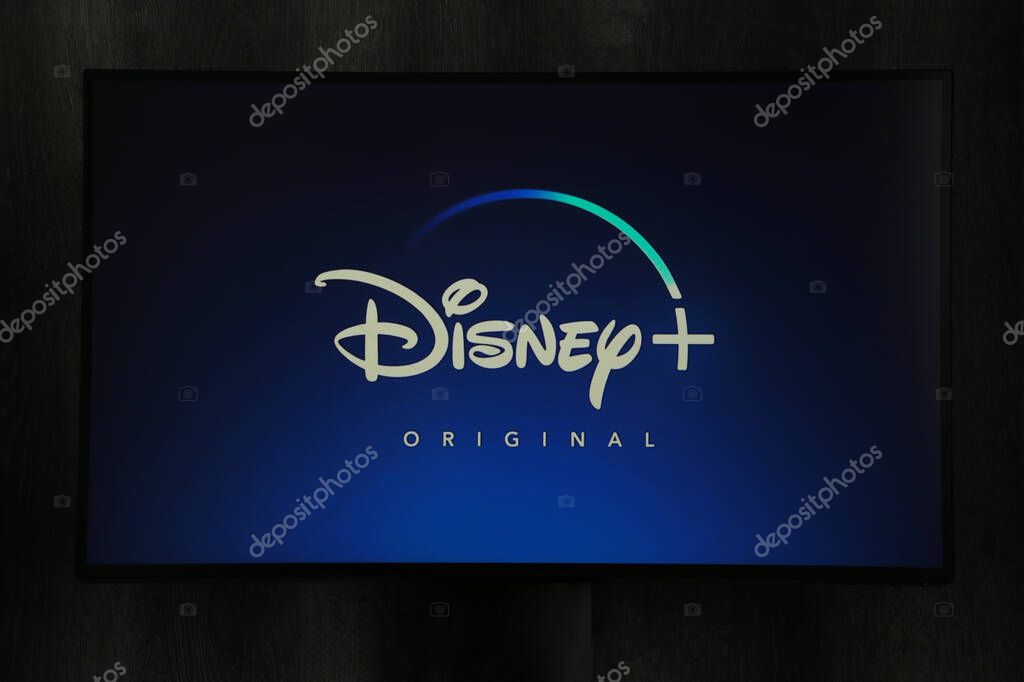 Nikolaev, Ukraine - November 20, 2021. In this photo illustration the Disney logo background. Top view.