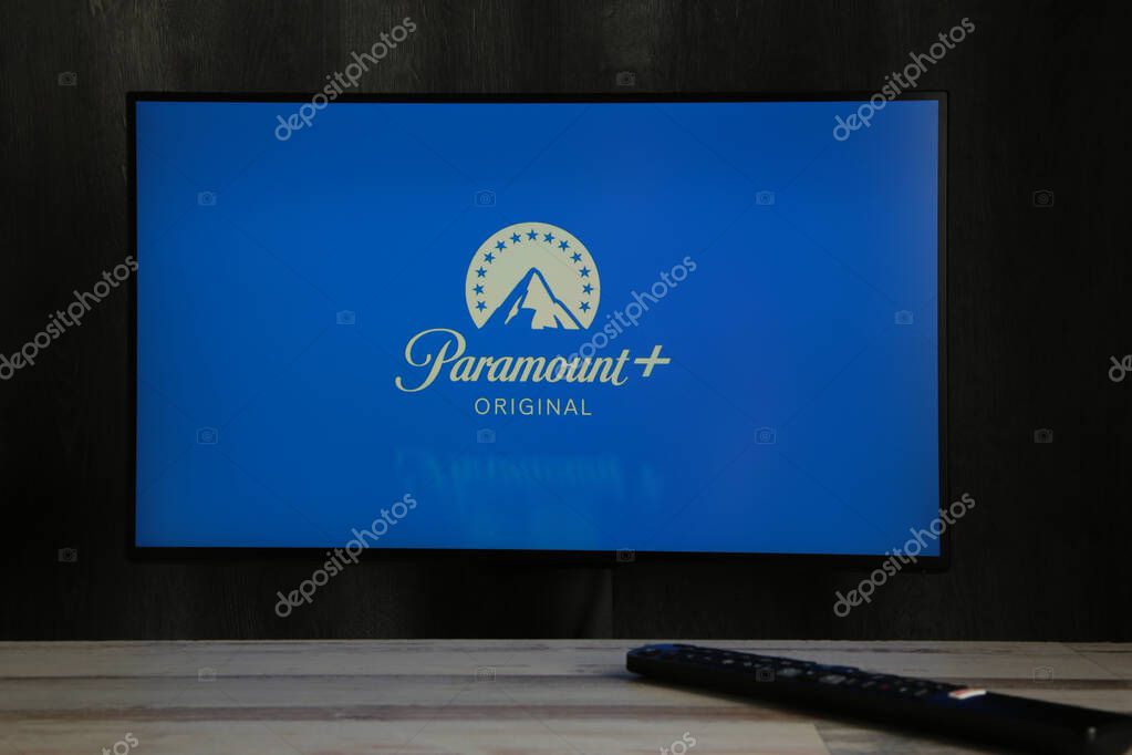 Nikolaev, Ukraine - November 20, 2021. In this photo illustration the Paramount Pictures Corporation logo in background. Top view.