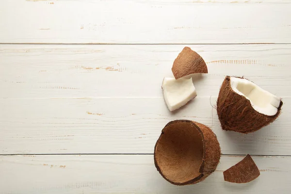 Fresh Coconut White Wooden Background Top View — стоковое фото